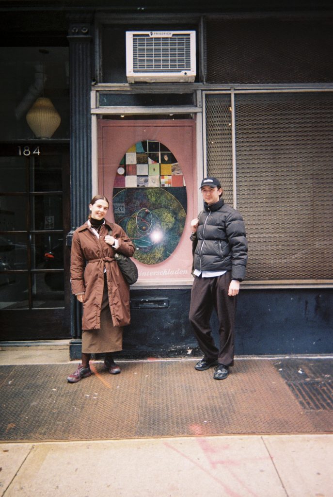 Lovely Londoners, curator/writer Ted Targett and artist/curator Anna Eaves, popping by (in coordinating Kiko ASICS) amazing London-based artist Kenneth Winterschladen’s piece I have up in the window outside Theta.