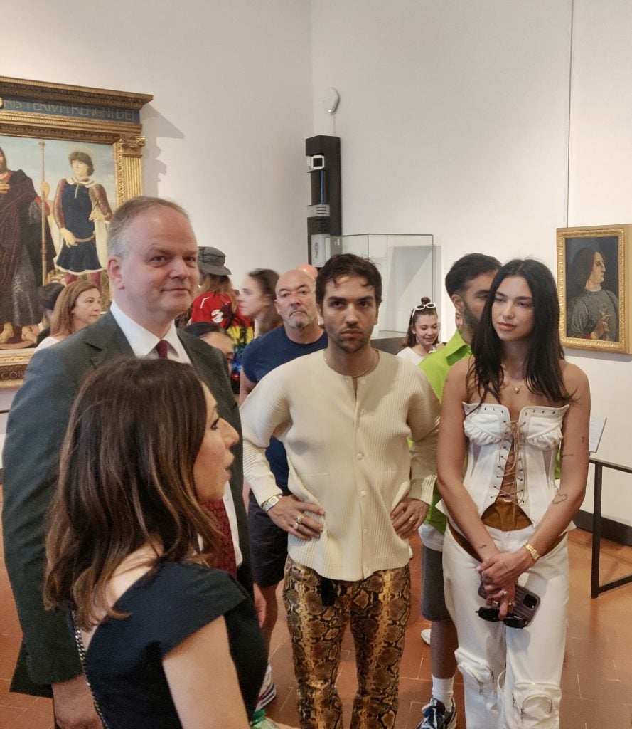 Museum director Eike Schmidt leads a tour of the Uffizi Galleries for pop star Dua Lipa. Courtesy the Uffizi Galleries.