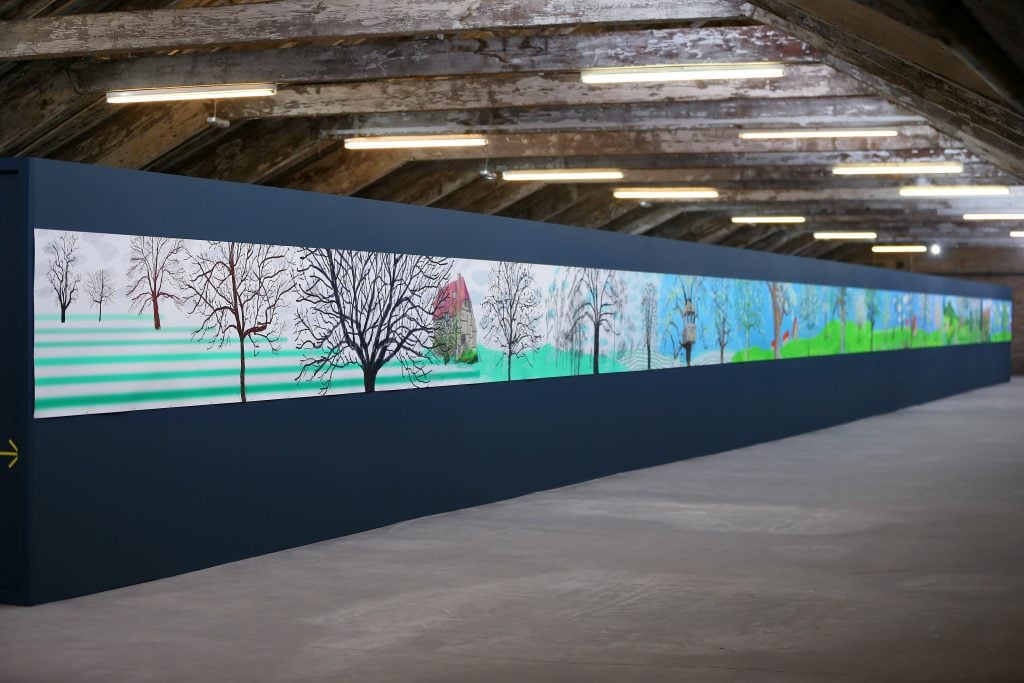 David Hockney's biggest ever picture, <i>A Year In Normandy<i> at Salts Mill, Saltaire, West Yorkshire. The artwork joins to gather some of the 220 iPad works Hockney created throughout 2020. Picture by Lorne Campbell / Guzelian.
