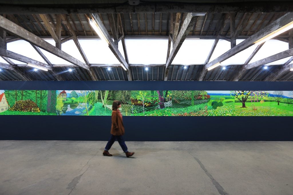 David Hockney's biggest ever picture, A Year In Normandy at Salts Mill, Saltaire, West Yorkshire. The artwork joins to gather some of the 220 iPad works Hockney created throughout 2020. Picture by Lorne Campbell / Guzelian.
