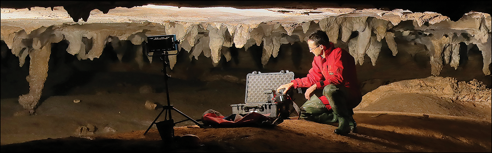 Stephen Alvarez in the glyph chamber of the 19th Unnamed Cave, Alabama (Photograph by A. Cressler).