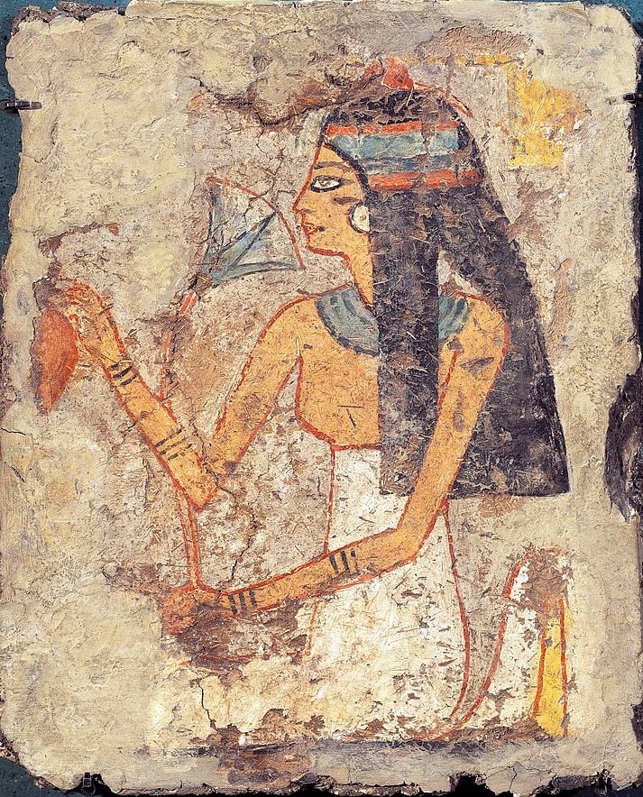 Fragment of painting on lemon wood depicting a woman at her toilet putting on some scent. Photo By DEA / G. DAGLI ORTI/De Agostini via Getty Images.