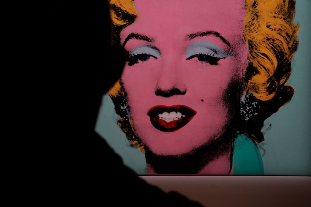 Andy Warhol's 1964 Shot Sage Blue Marilyn sold for $195 million at Christie's. (Photo by TIMOTHY A. CLARY/AFP via Getty Images)