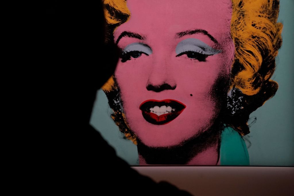 Marilyn Monroe having a movie break print by Celebrity Collection