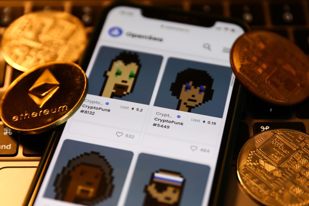 CryptoPunks collection in OpenSea displayed on a phone screen. (Photo by Jakub Porzycki/NurPhoto via Getty Images)