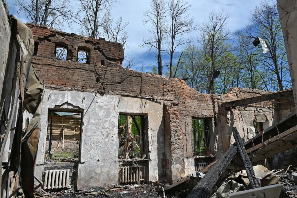 A photograph shows the destroyed building of the Hryhoriy Skovoroda National Literary Memorial Museum in the village of Skovorodynivka, in Kharkiv Region, on May 7, 2022. Photo: Sergey Bobok/AFP via Getty Images.