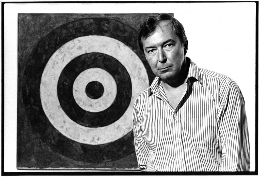Artist Jasper Johns pictured at an exhibition of his work at the Whitney Museum of American Art in 1977. Photo by Jack Mitchell/Getty Images.