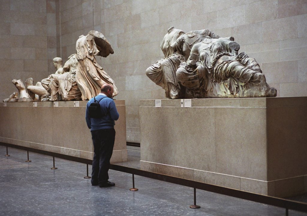 Marble sculptures taken from the Parthenon in Athens, Greece, almost 200 years ago were on display January 21, 2002, at the British Museum in London, England. Photo: Graham Barclay, BWP Media/Getty Images.