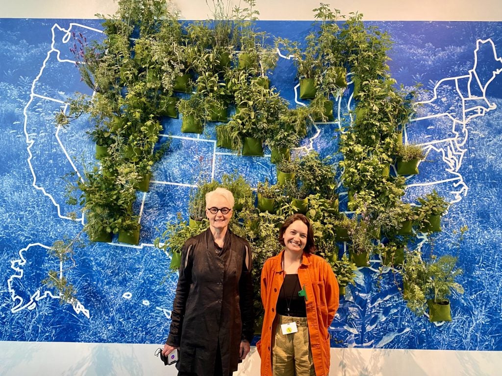 Maureen Connor and Landon Newton of How to Perform an Abortion with the collective's piece Trigger Planting presented by A.I.R. Gallery at Frieze New York. The third member of the collective is Kadambari Baxi. Photo by Sarah Cascone.
