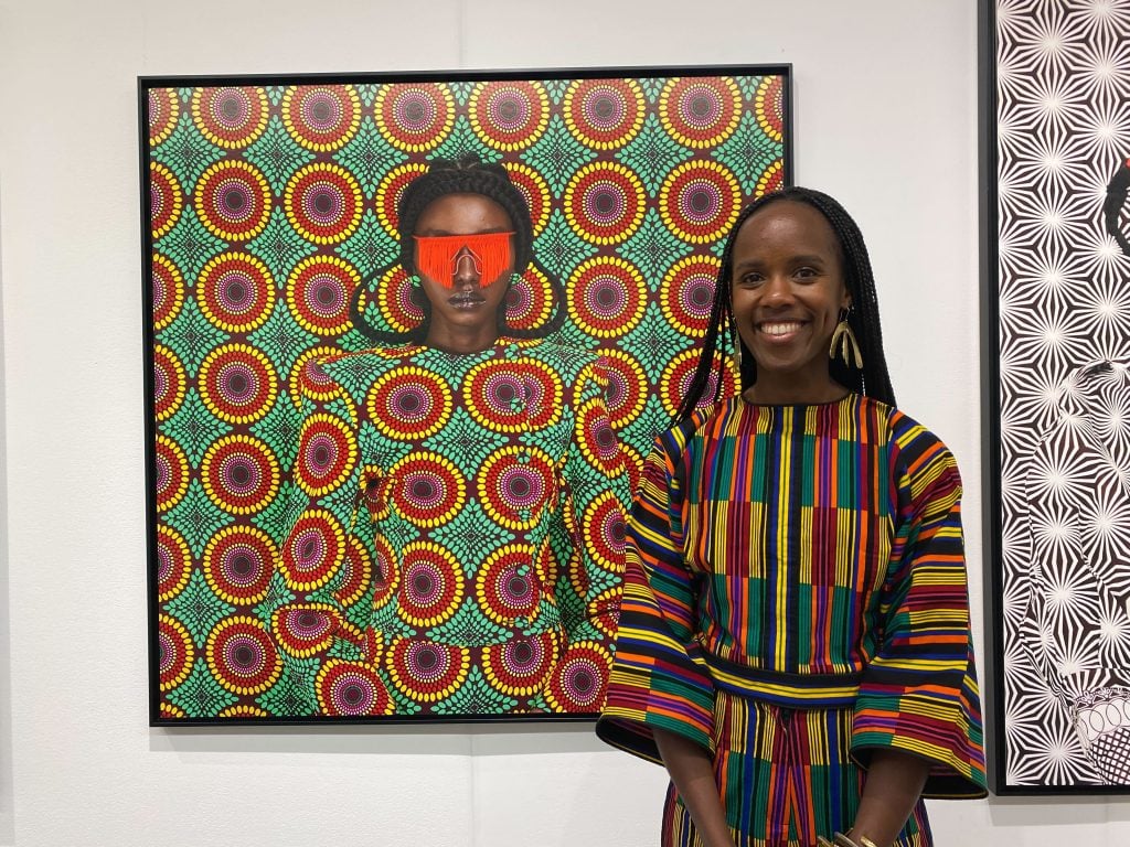Thandiwe Muriu with a piece from her "Camo" series at 1-54 New York. Photo by Sarah Cascone.
