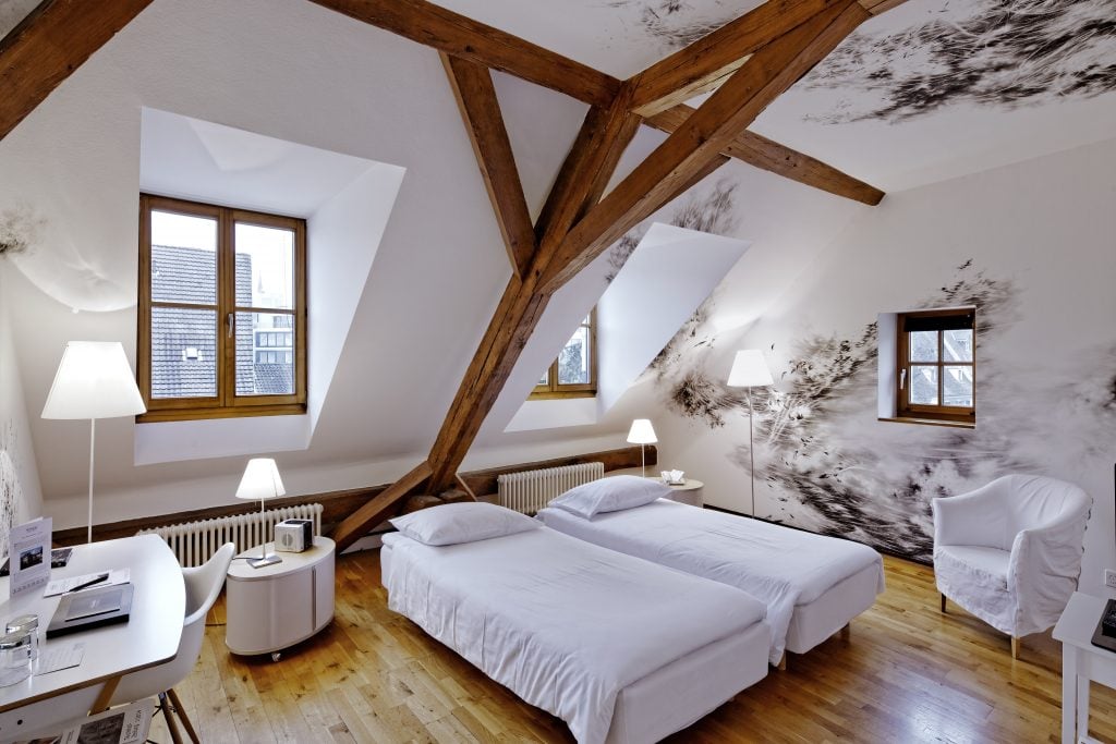A room at Der Teufelhof, designed by artist Julia Steiner Kunstzimmer. Courtesy of the hotel.