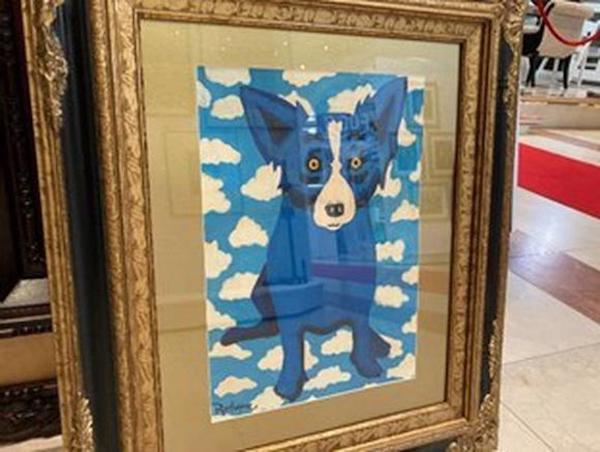 A fake George Rodrigue painting, <em>Blue Dog</em>, that Daniel Elie Bouaziz was selling for $48,000. Photo courtesy of the U.S. Department of Justice. 