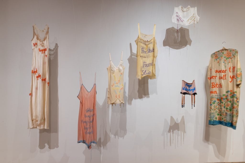 Installation view of Zoe Buckman's works in "Garmenting: Costume as Contemporary Art at the Museum of Arts and Design, New York, 2022. Photo by Jenna Bascom. Courtesy the Museum of Arts and Design