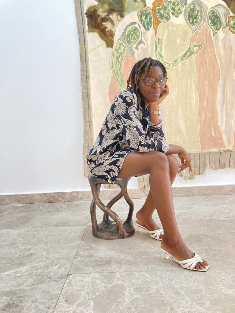Nene. I have been so privileged to work with an incredible team. My studio manager Nene and my studio technician Olawale. Here’s a picture of Nene sitting for a painting.