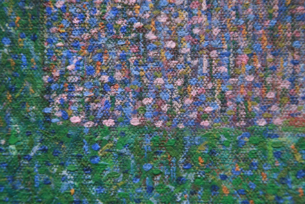 Detail of the Pointillist frame Seurat added to the composition.
