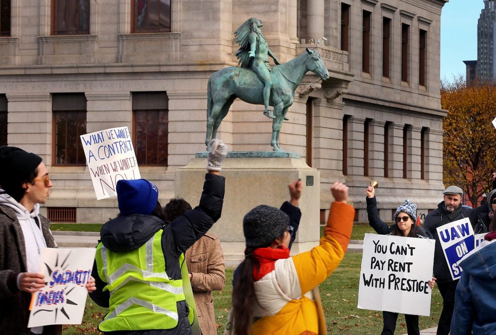 The Museum of Fine Arts staff went on a one-day strike on November 17, 2021 to protest low wages and benefit issues, picketing in front of the museum's main entrance on Huntington Ave in Boston. Photo by John Tlumacki/The Boston Globe via Getty Images.