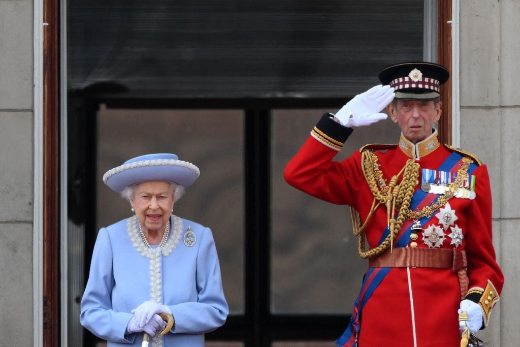 Britain's Queen Elizabeth II stands with Britain's Prince Edward, Duke of Kent, on the balcony of Buckingham Palace during the Queen's Birthday Parade in London on June 2, 2022. (Photo by DANIEL LEAL/AFP via Getty Images)