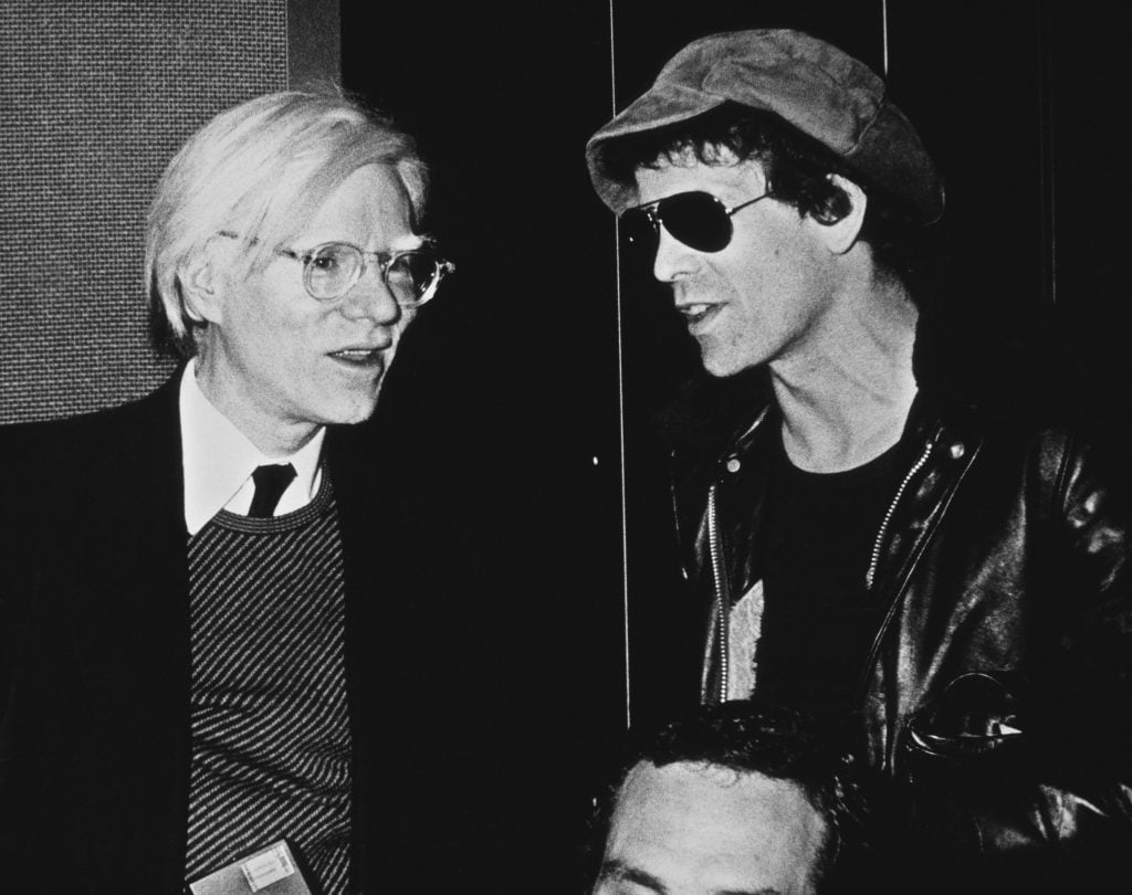 Mentor and muse Andy Warhol and Lou Reed, circa 1980. Photo: Richard E. Aaron/Redferns/Getty Images.
