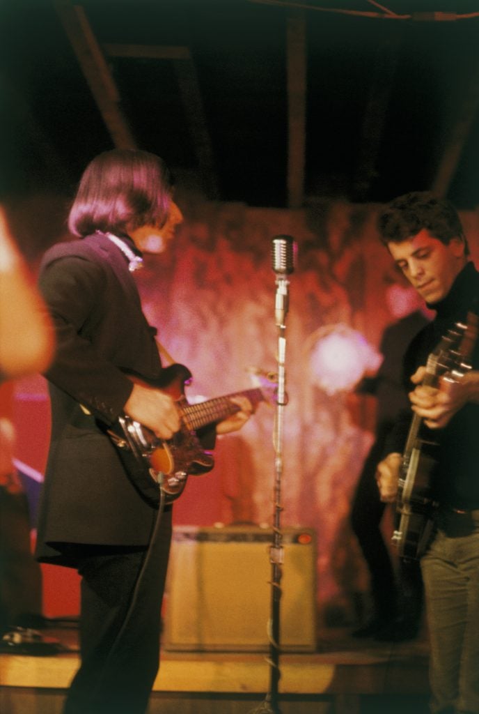 John Cale and Lou Reed of the Velvet Underground perform at the Cafe Bizarre, New York, December 1965. Photo by Adam Ritchie/Redferns.