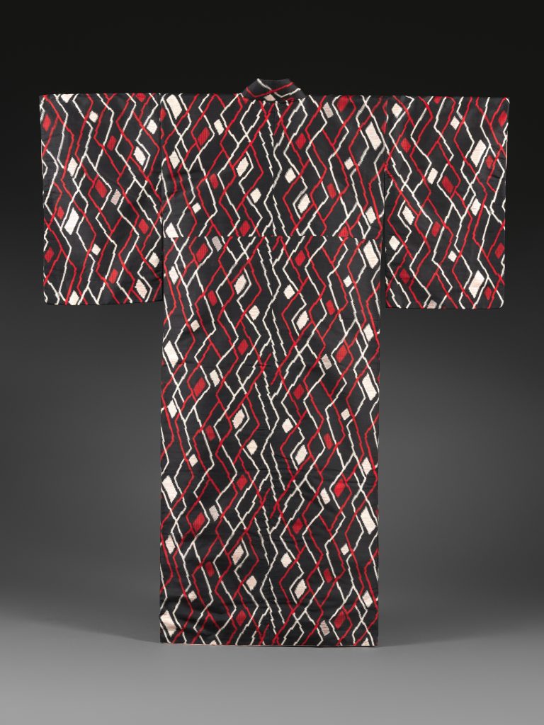 Meisen kimono with rhombus print.  Showa period (1926-1989), ca.  1950–55.  Plain weave silk warps with machine-spun silk wefts in double ikat (heiyō-gasuri).  Promised Gift of John C. Weber.  Photo by Paul Lachenauer, courtesy of The Met.