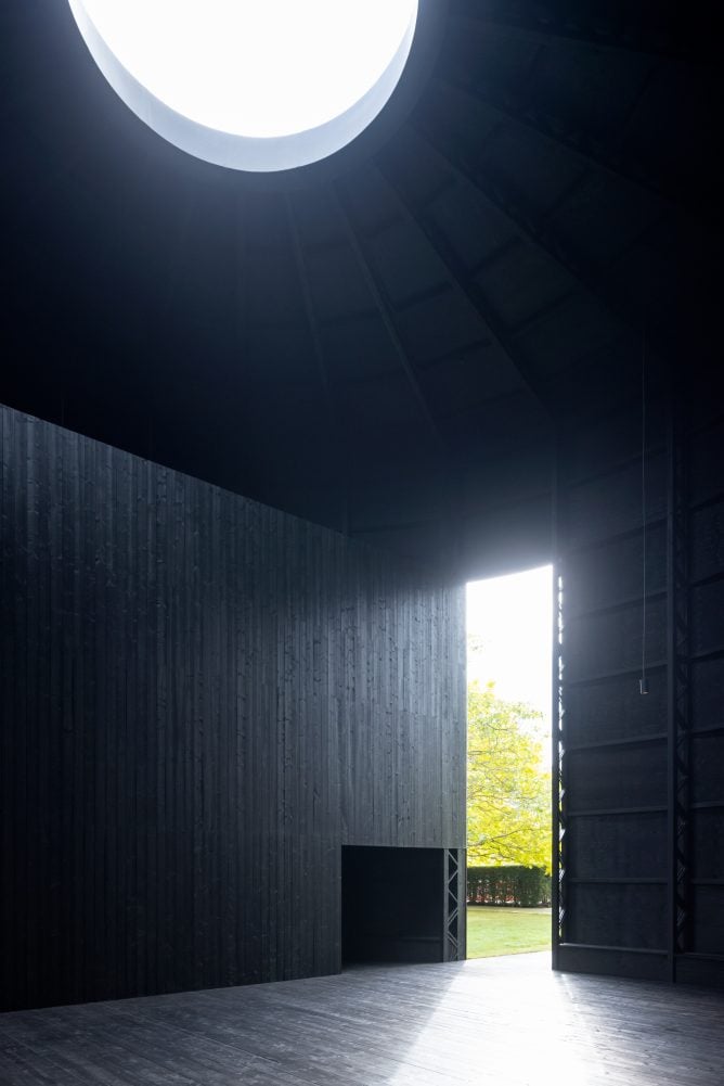 The Serpentine Pavilion 2022, <em>Black Chapel</em>, designed by Gates—the first non-architect tapped for the annual commission. Photo: Iwan Baan. Courtesy of Theaster Gates Studio, Serpentine.