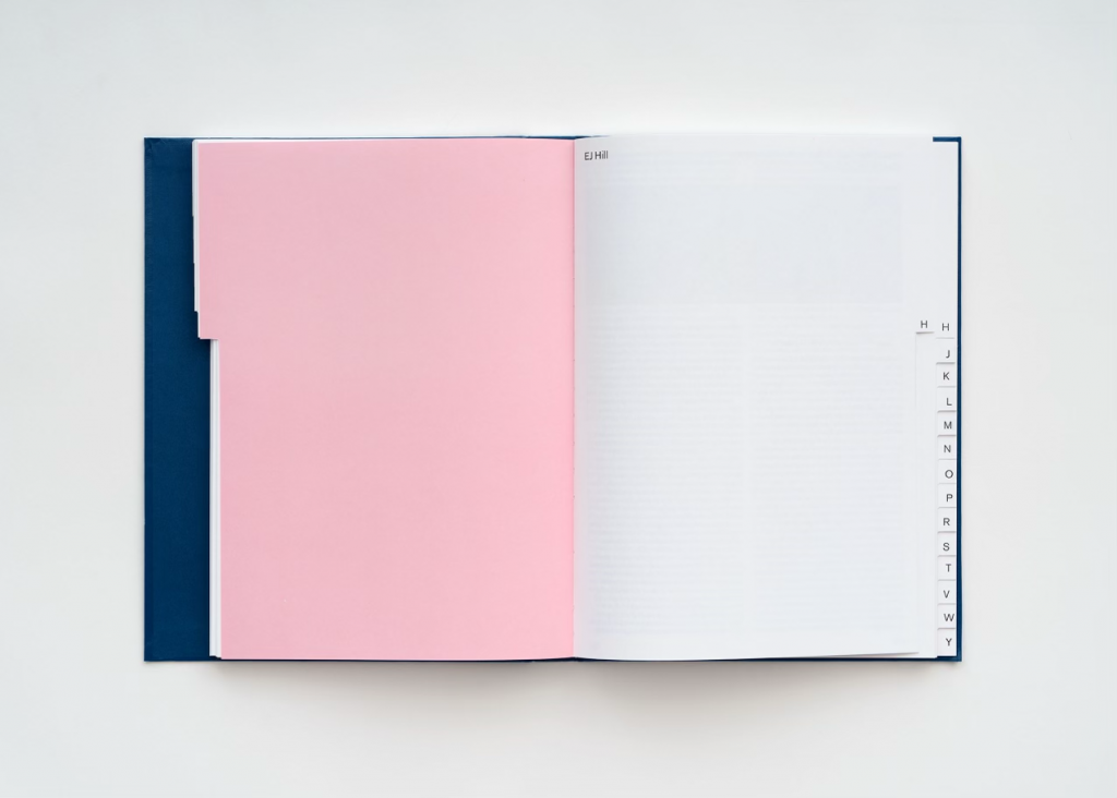 EJ Hill's contribution to the 2022 Whitney Biennial is a blank pink page in the exhibition catalogue. Photo by Paul Salveson.
