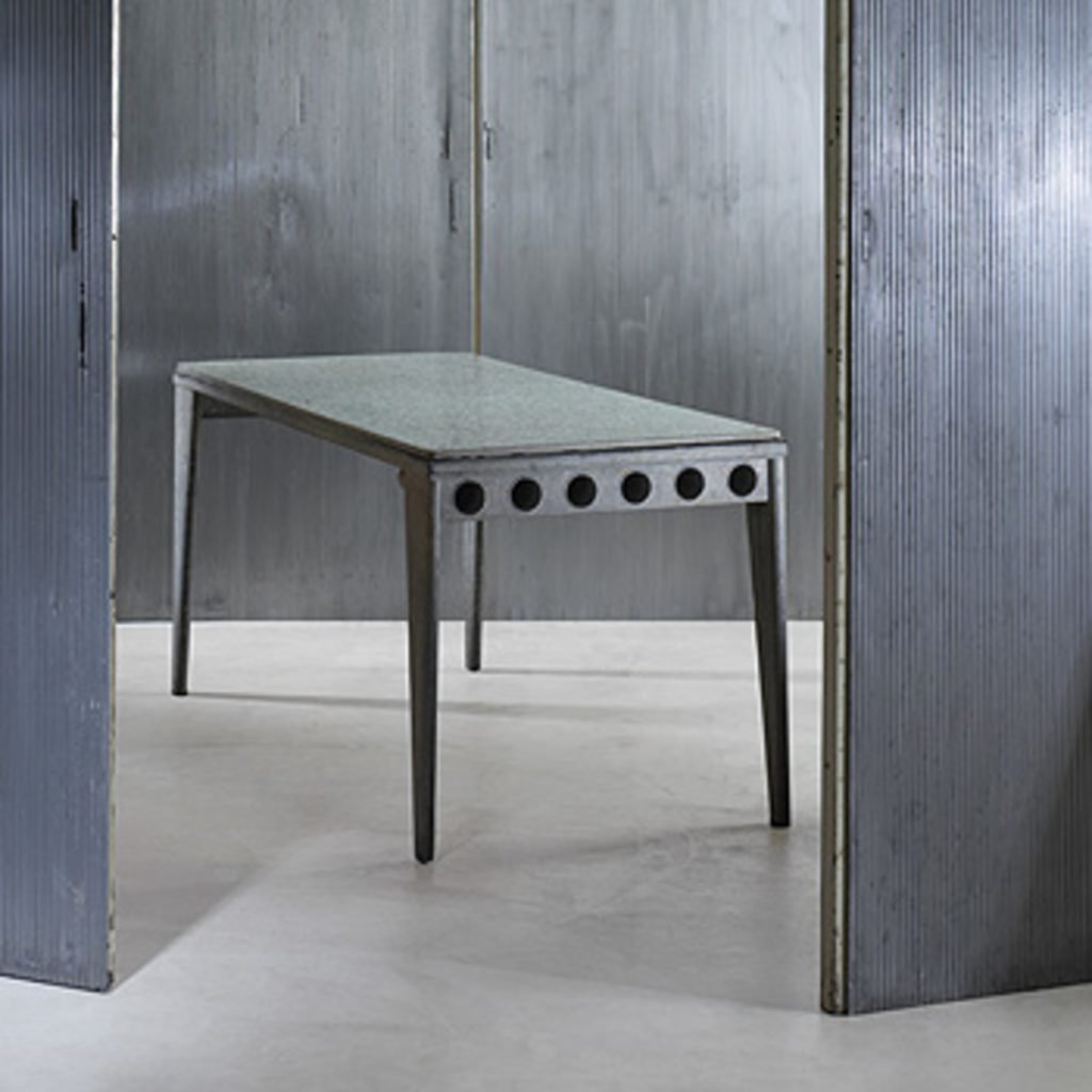 This Jean Prouvé refectory table with a "fibrated Granipoli concrete" top sold for $252,000 at Wright in Chicago in September 2005. Granipoli is a trade term for an asbestos product. Photo courtesy of Wright.