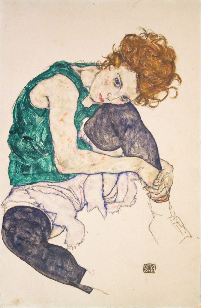 Egon Schiele, Seated Woman with Legs Drawn Up (1917). The model for the work was the artist's sister-in-law, Adele Harms. Collection of the National Gallery in Prague.