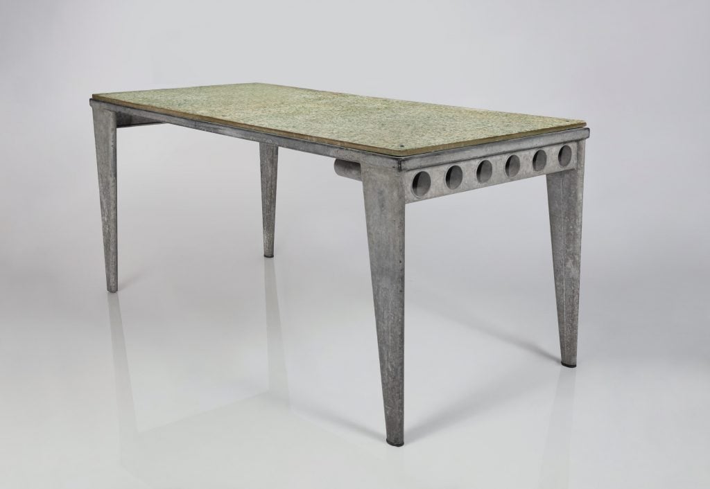 This Jean Prouvé refectory table with a "fibrated Granipoli concrete" top from the collection of Ken Mazik sold for $1.623 million at Sotheby's New York in June 2022. Granipoli is a trade term for an asbestos product. Photo courtesy of Sotheby's New York.