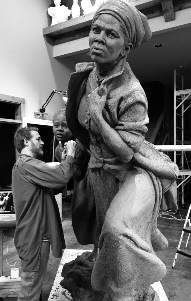 Wesley Wofford working on <em>Harriet Tubman: The Journey to Freedom</em>. Photo courtesy of the artist. 