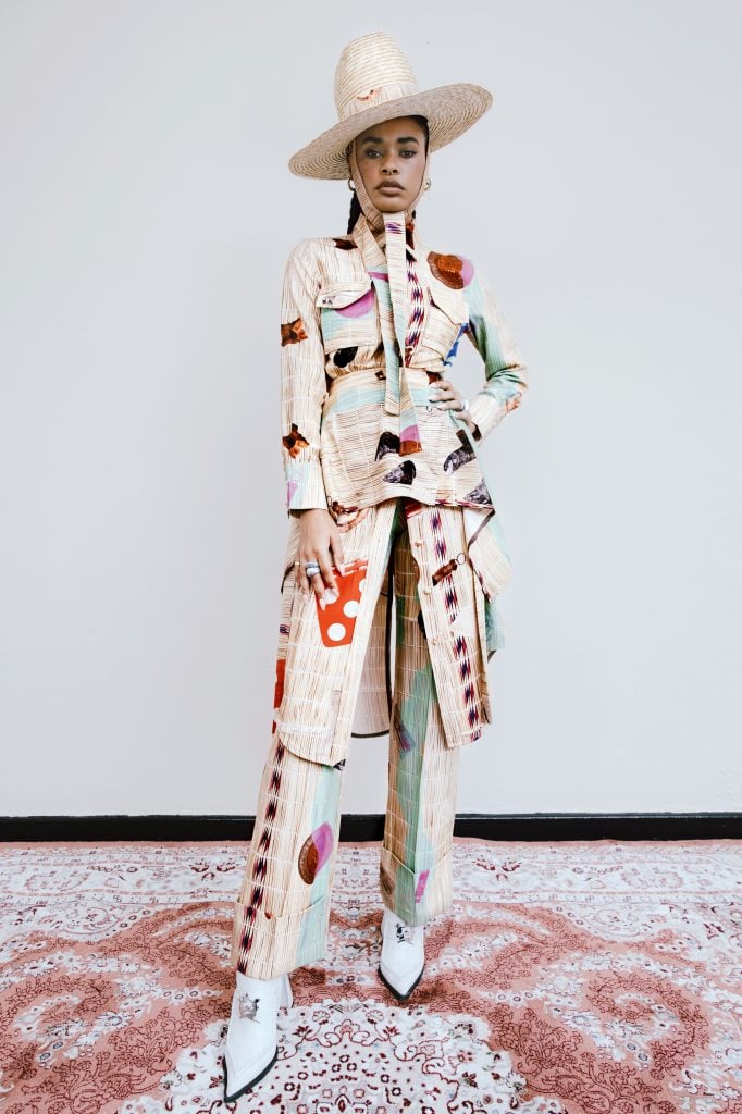A look from Thebe Magugu's fall-winter 2021 Alchemy collection.  Photography: Tatenda Chidora;  Styling + Set: Chloe Andrea Welgemoed;  Model: Yes.