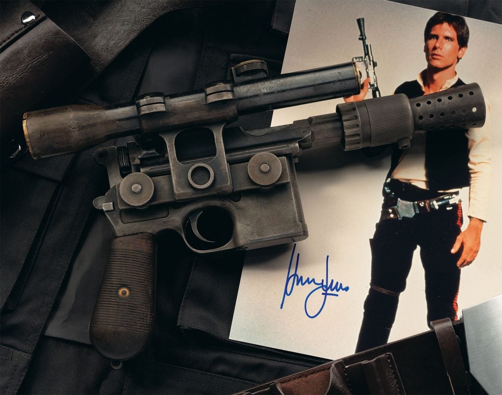 Harrison Ford carrying the original DL-44 Heavy Blaster Pistol. Courtesy of Rock Island Auction Company.