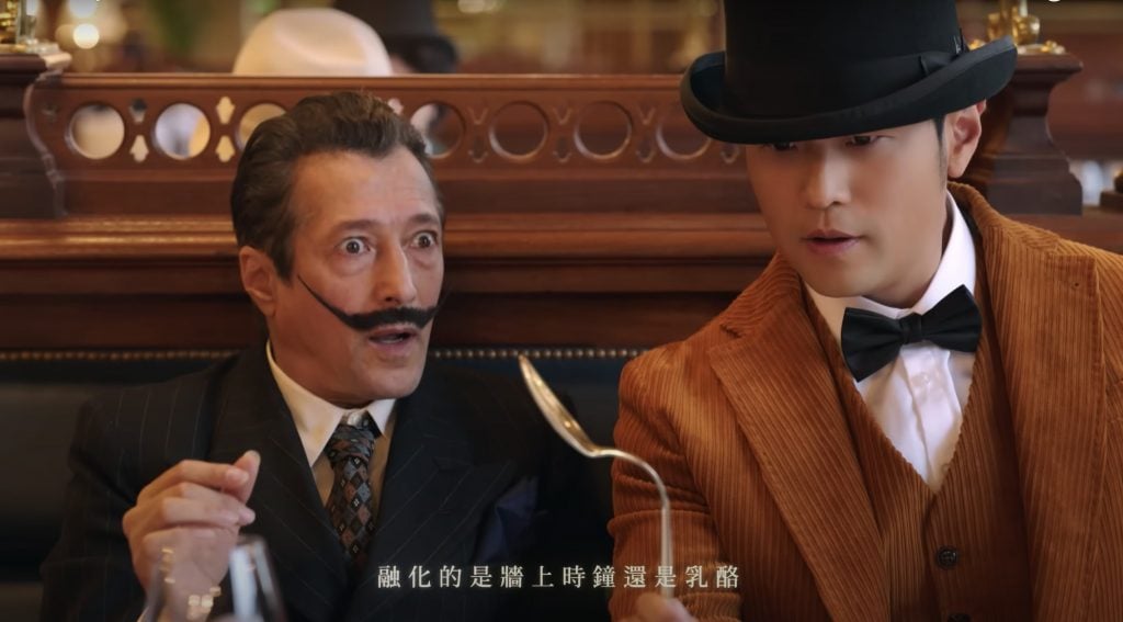 Taiwanese pop star and art collector Jay Chou shows off his magic tricks in front of Salvador Dali in his art fantasy music video Greatest Works of Art. Screen shot of the music video now playing on YouTube.