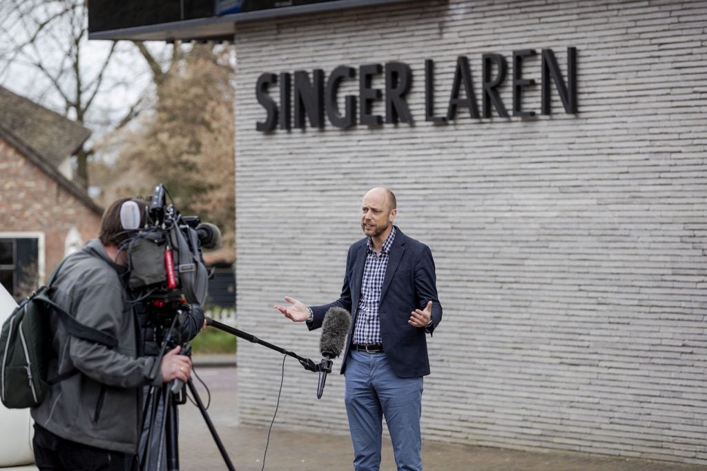 Evert van Os speaks to the press outside the museum on March 30, 2020 in Laren, about 30 kilometres southeast of Amsterdam, after a painting by Vincent van Gogh Parsonage Garden at Neunen in Spring (1884) was stolen. The museum was closed due to the COVID-19 pandemic at the time. The criminals entered the museum at around 3.15 am (0115 GMT) by breaking open a front glass door, police and Dutch news reports said. (Photo by Robin VAN LONKHUIJSEN / ANP / AFP) / Netherlands OUT (Photo by ROBIN VAN LONKHUIJSEN/ANP/AFP via Getty Images)