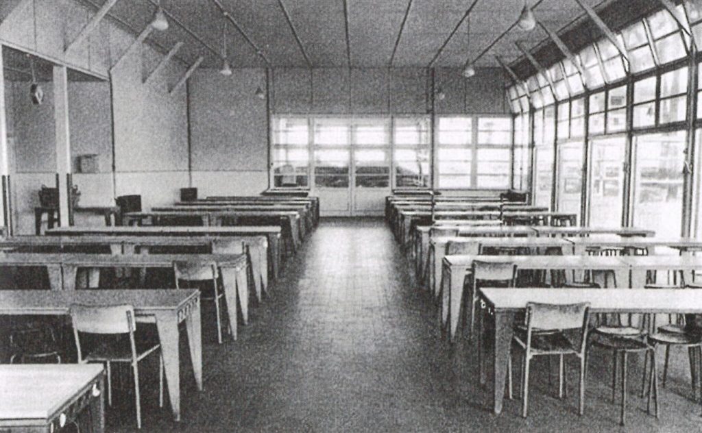Jean Prouvé refectory tables as seen at La Pierre Attelée summer camp, Saint-Brévin l'Océan, France. Photo courtesy of Sotheby's New York.