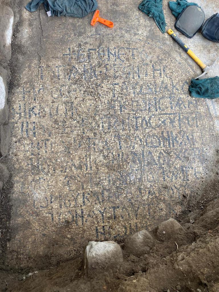 The inscription in the mosaic floor found in the remains of what archaeologists believe is the Byzantine Church of the Apostles built to stand over the home of St. Peter and his brother, Andrew. Photo courtesy of the El Araj Expedition.