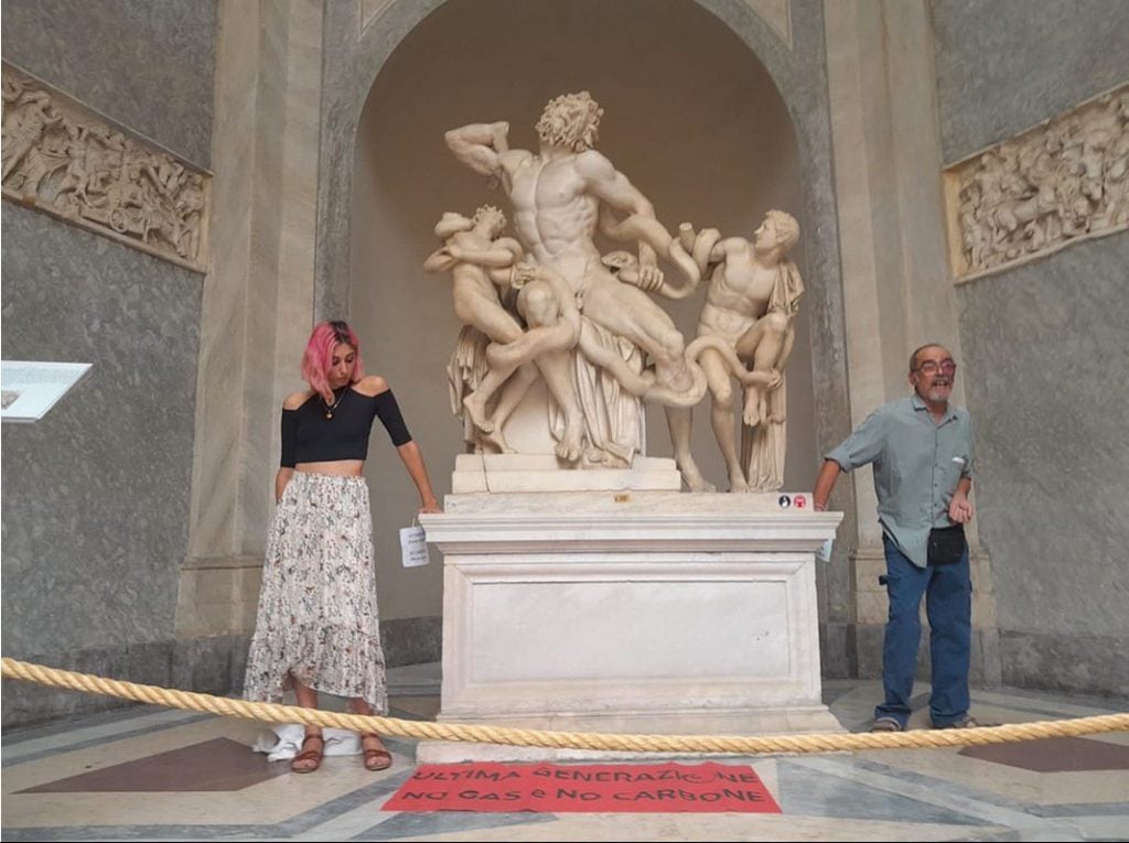 Ultima Generazione activists glued themselves to <em>Laocoön and His Sons</em> at the Vatican Museum in Rome. Photo courtesy of Ultima Generazione.