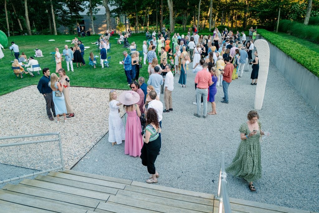 Guests mill about at the Watermill.  Photo by Jason Crowley/BFA, courtesy of Pelham Communications. 