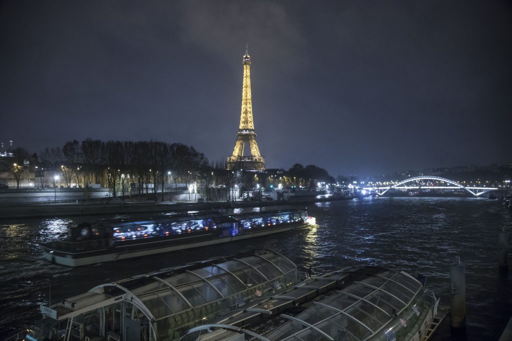 There's nothing quite like Paris by night! Photo by Nicolas Economou/SOPA Images/LightRocket via Getty Images.