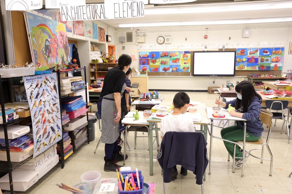 Rebecca Riley teaches an art lesson at Yung Wing School P.S. 124 in New York City. Photo by Michael Loccisano/Getty Images.