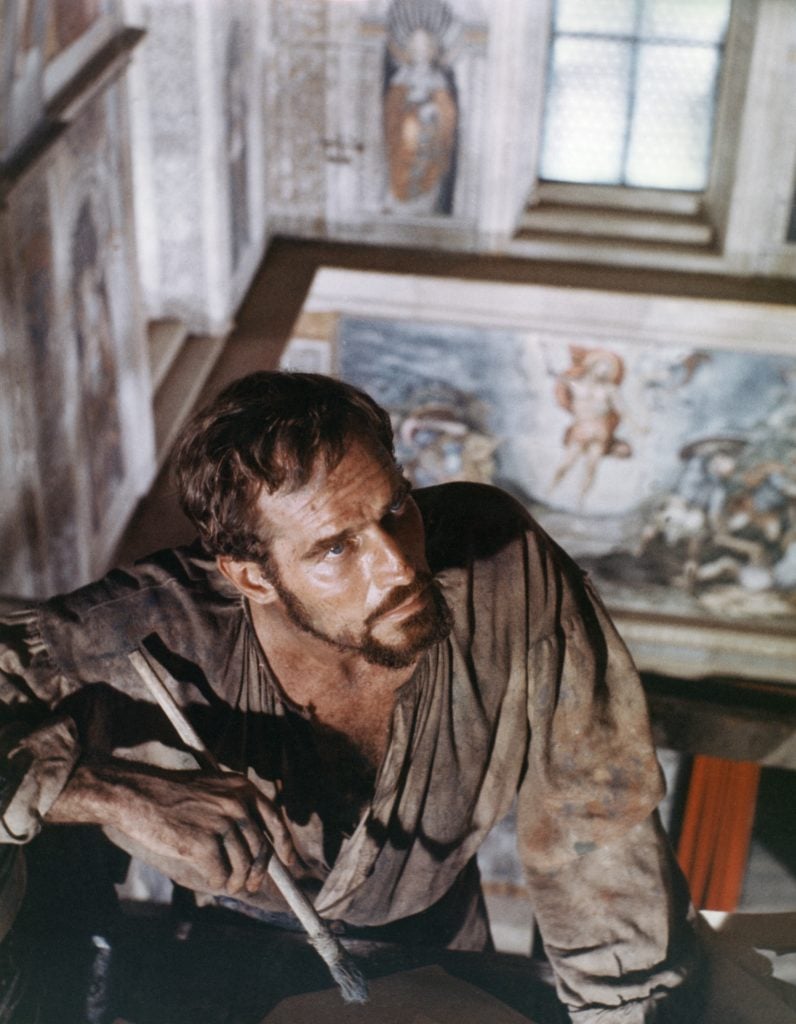 Actor Charlton Heston on the set of The Agony and the Ecstasy. (Photo by Sunset Boulevard/Corbis via Getty Images)