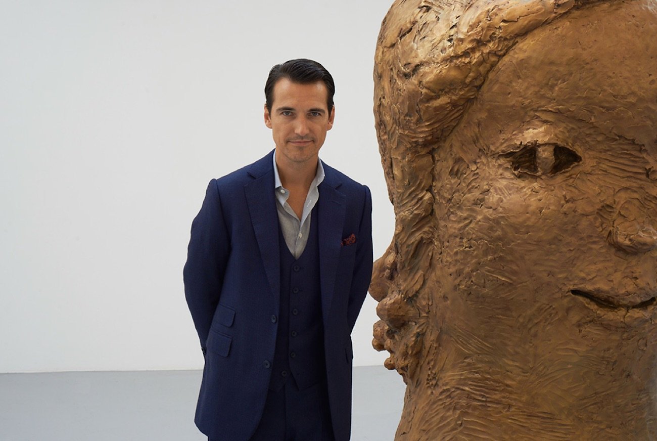 Nicolai Frahm with a sculpture by Yoshitomo Nara. Image courtesy Nicolai Frahm.