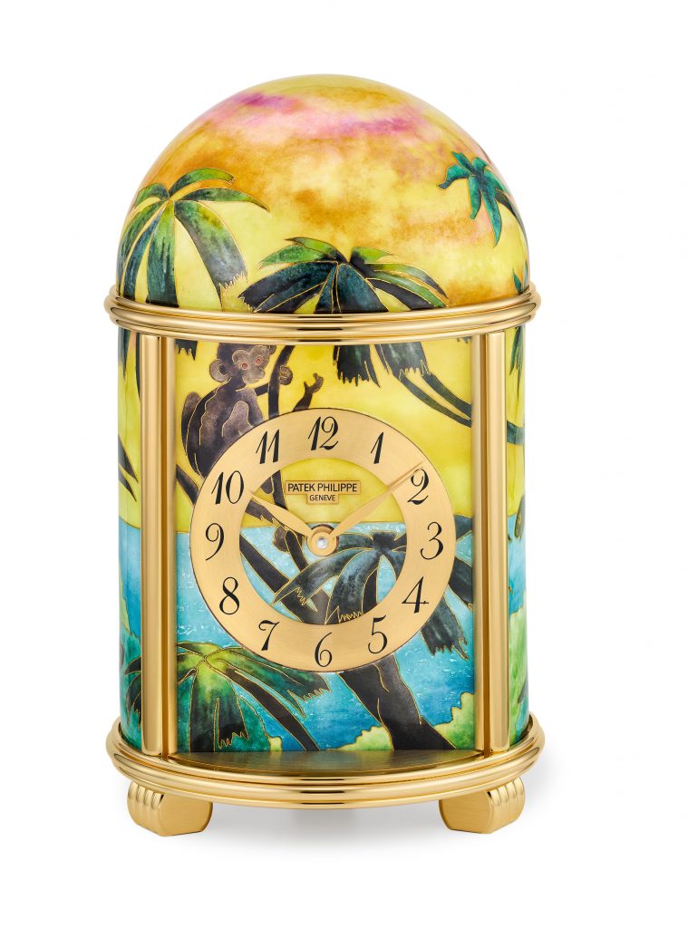 This unique table clock in Grand Feu cloisonné enamel conjures the enchantment of a tropical forest at the ocean’s edge—with an almost perceptible scent of orchids in the air. Courtesy of Patek Philippe.
