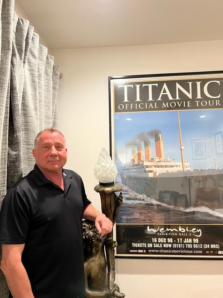 Mark Biallas, at home in Los Angeles with a statue of the angel seen at the foot of the staircase in <i>Titanic</i>. Photo: Mark Biallas.