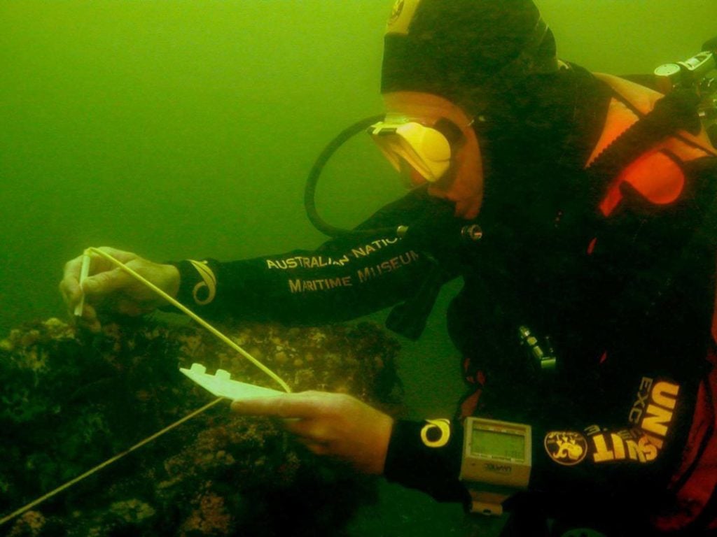 A diver investigates the believed site of the shipwreck of the <em>Endeavour</em>. Photo courtesy of the Australian National Maritime Museum. 