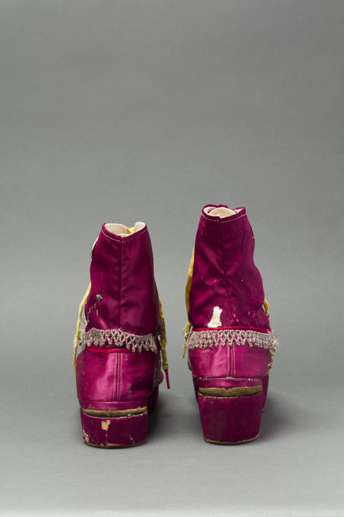 Kahlo's customized silk ankle boots. © Museo Frida Kahlo - Casa Azul collection - Javier Hinojosa, 2017.