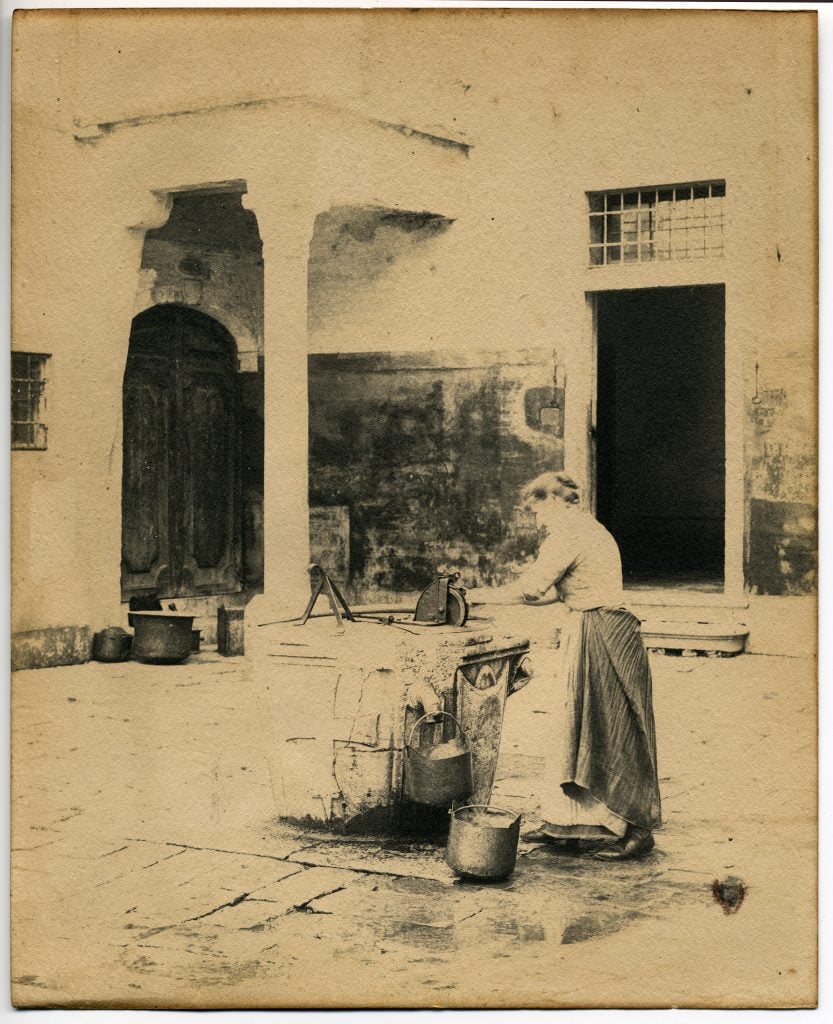 Alfred Stieglitz, A Venetian Courtyard (1894). Jeff Sedlik purchased this faded platinum print at auction and discovered a second perfectly preserved print of the image hidden inside the frame.