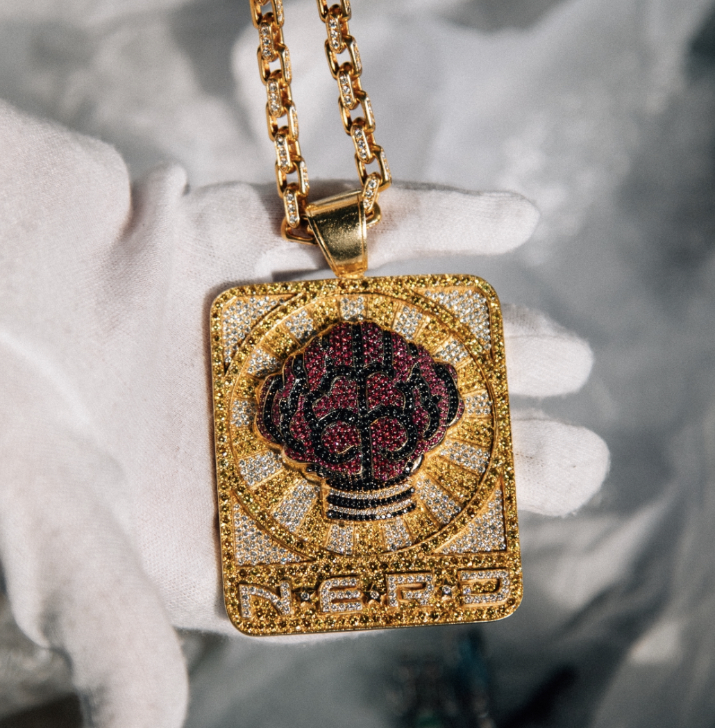 Sold at Auction: 14k YG WG Diamond Louis Vuitton Pendant Necklace