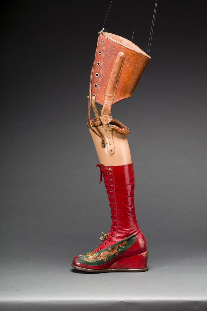 Kahlo's prosthetic leg has a leather boot with embroidered silk appliqué. © Museo Frida Kahlo - Casa Azul collection - Javier Hinojosa, 2017.