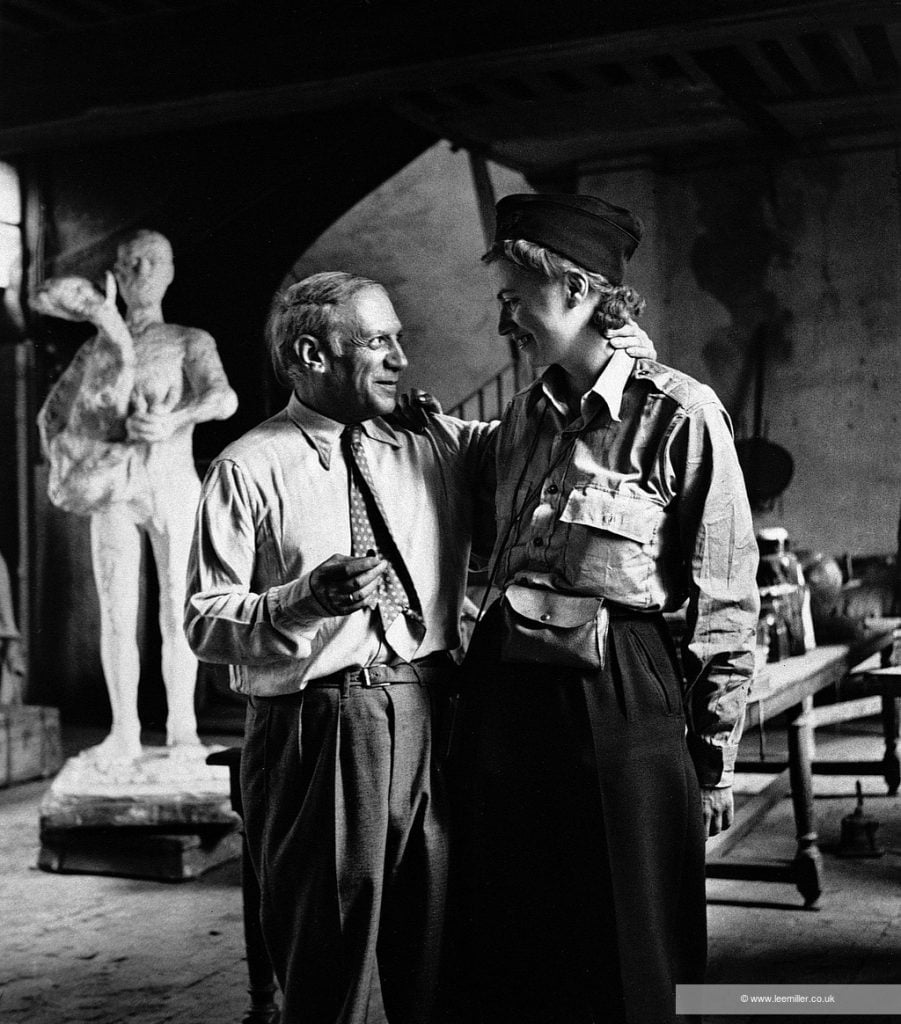 Picasso and Lee Miller in his studio, Liberation of Paris, Rue des Grands Augustins, Paris France (1944) by Lee Miller. © Lee Miller Archives, England 2022; all rights reserved; www.leemiller.co.uk. © Succession Picasso/DACS 2022.